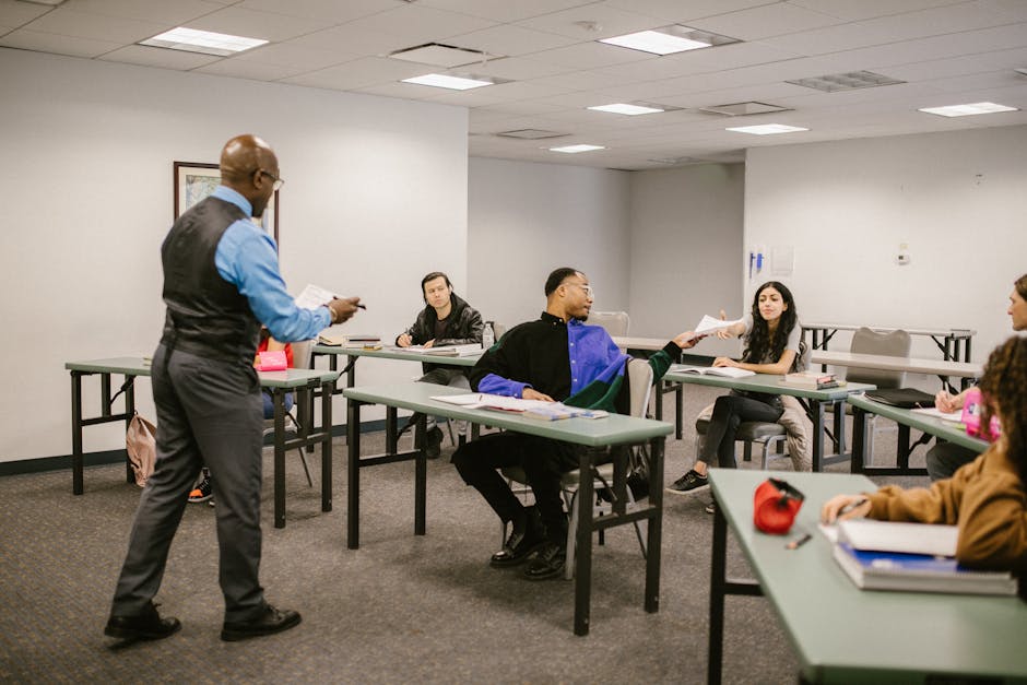 University classroom with students receiving instructions from a professor